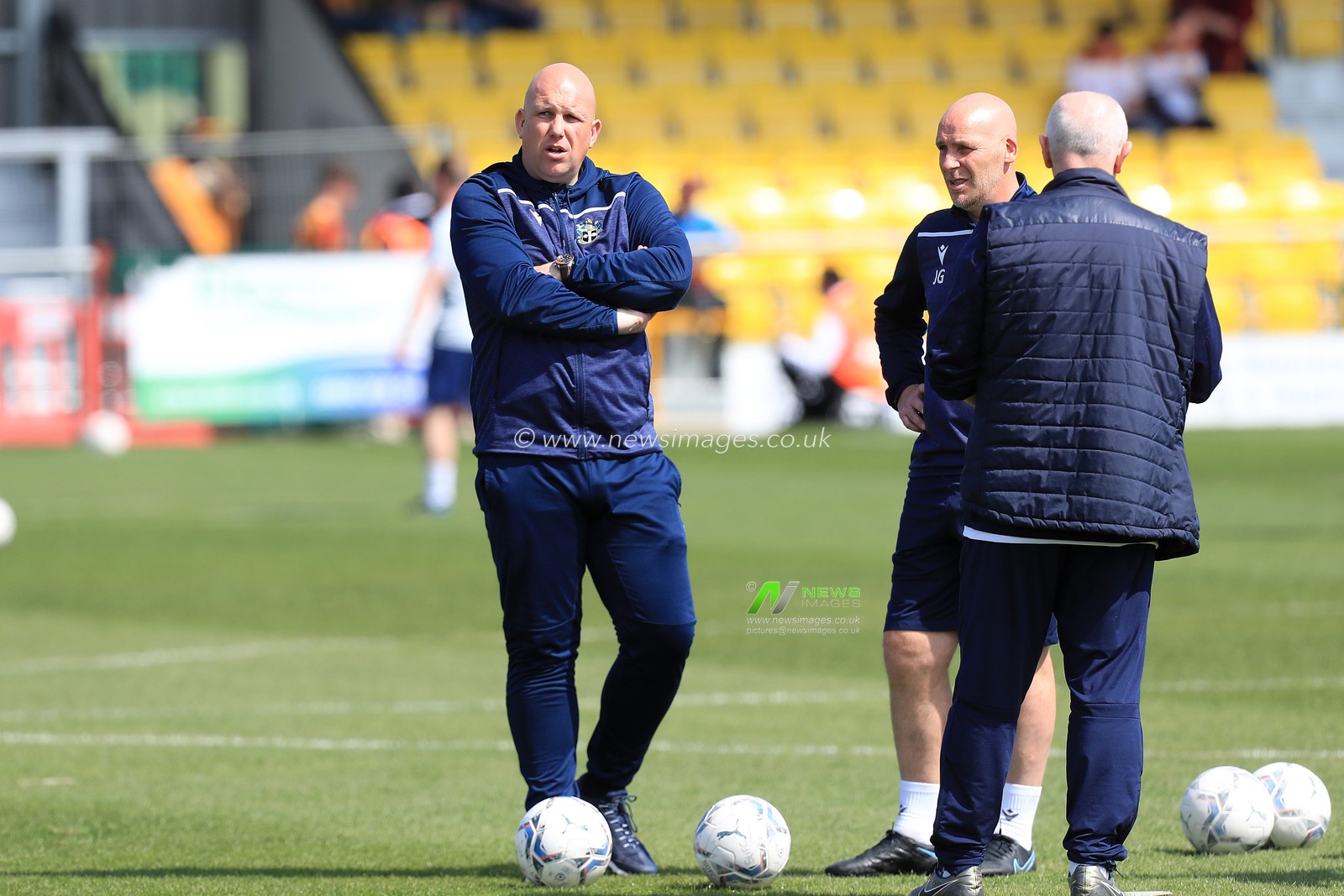 Matt Gray manager of Sutton United watching the warm up prior to kick off.