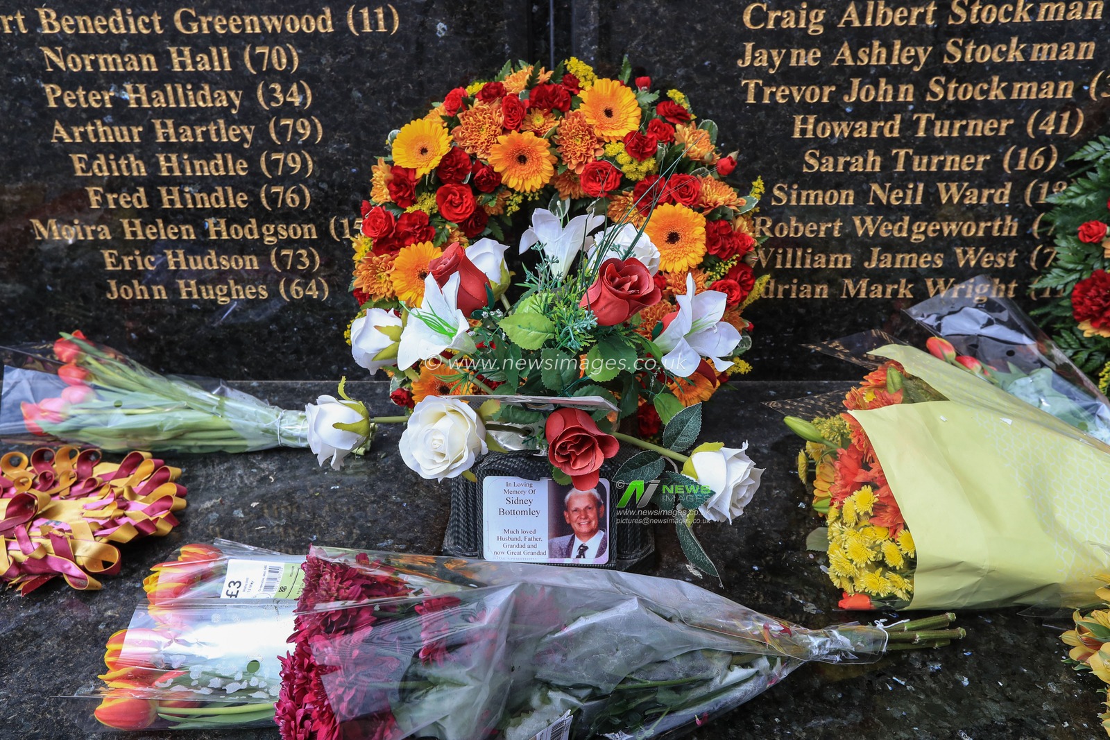 Floweres are laid at the Valley Parade Fire Disaster 35th Memorial after Bradford City hold an online memorial due to the Corona Outbreak in memory of Sidney Bottomley