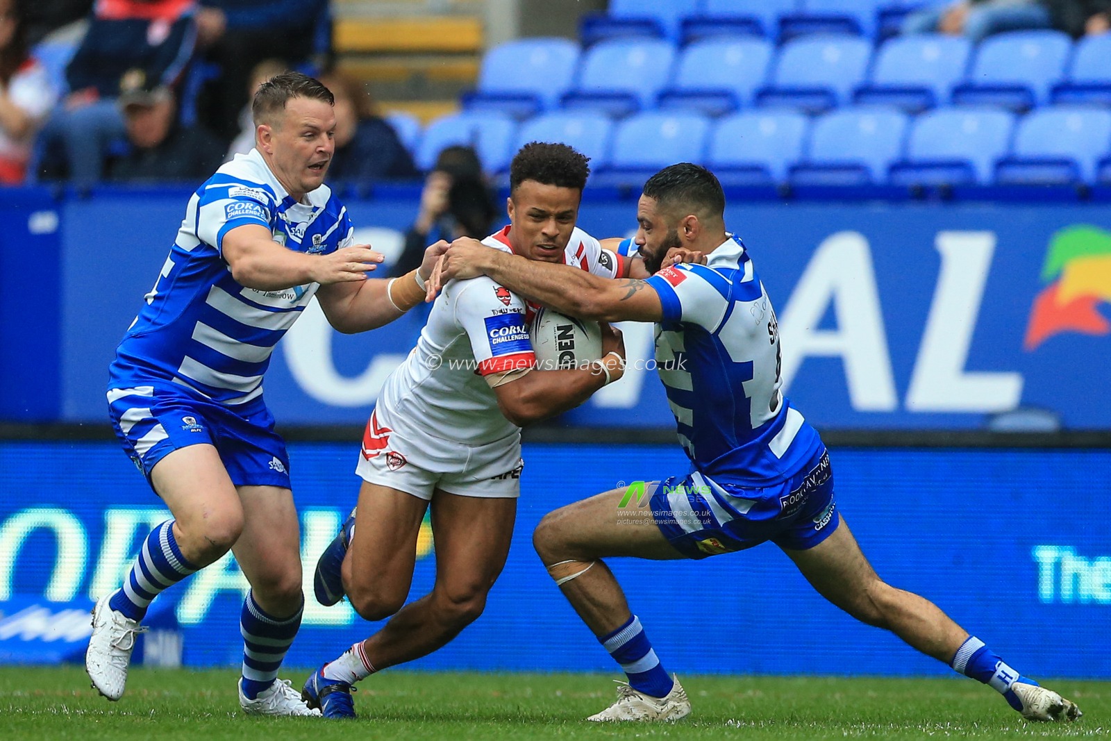 27th July 2019 , University of Bolton Stadium, Bolton, England; 2019 Coral Challenge Cup Semi-Final, St Helens vs Halifax RLFC ; Regan Grace (5) of St Helens tries to push past Will Sharp (5) of Halifax RLFC 


Credit: Mark Cosgrove/News Images