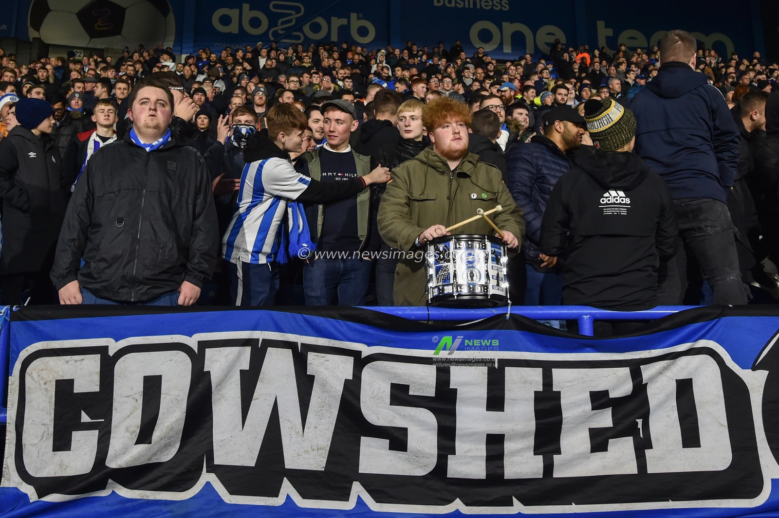 26th November 2019, John Smith's Stadium, Huddersfield, England; Sky Bet Championship, Huddersfield Town v Swansea City : Fans in Huddersfield Townâ€™s Cowshed end.

Credit: Dean Williams/News Images