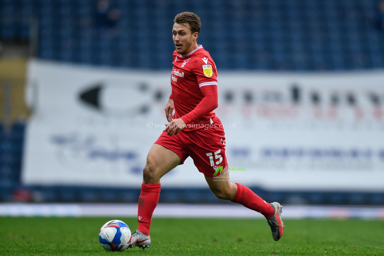 Luke Freeman (15) of Nottingham Forest runs forward with the ball