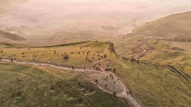 Sunrise hikers walk to the summit of Mam Tor as they watch the sunrise and admire the cloud inversion in the Hope Valley at Mam Tor in the Peak District at Mam Tor, Castleton, United Kingdom on 21 March 2026

(Photo by Mark Cosgrove/News Images)