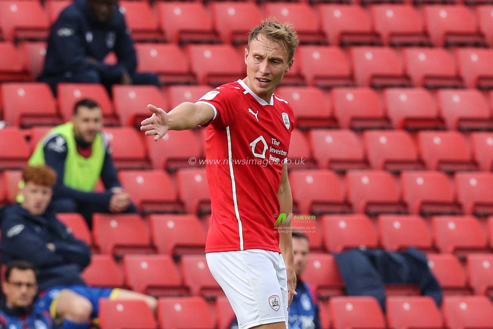 Cauley Woodrow (9) of Barnsley gestures to the referee