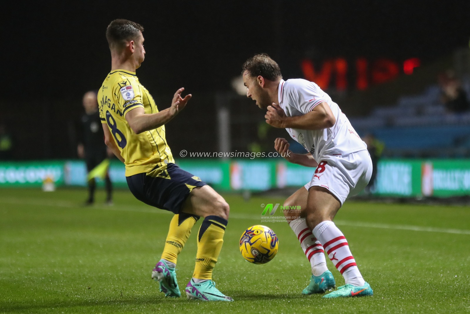 Herbie Kane of Barnsley holds the ball pressured by Cameron Brannagan of Oxford United during the Sky Bet League 1 match Oxford United vs Barnsley at Kassam Stadium, Oxford, United Kingdom, 23rd January 2024

(Photo by Alfie Cosgrove/News Images)