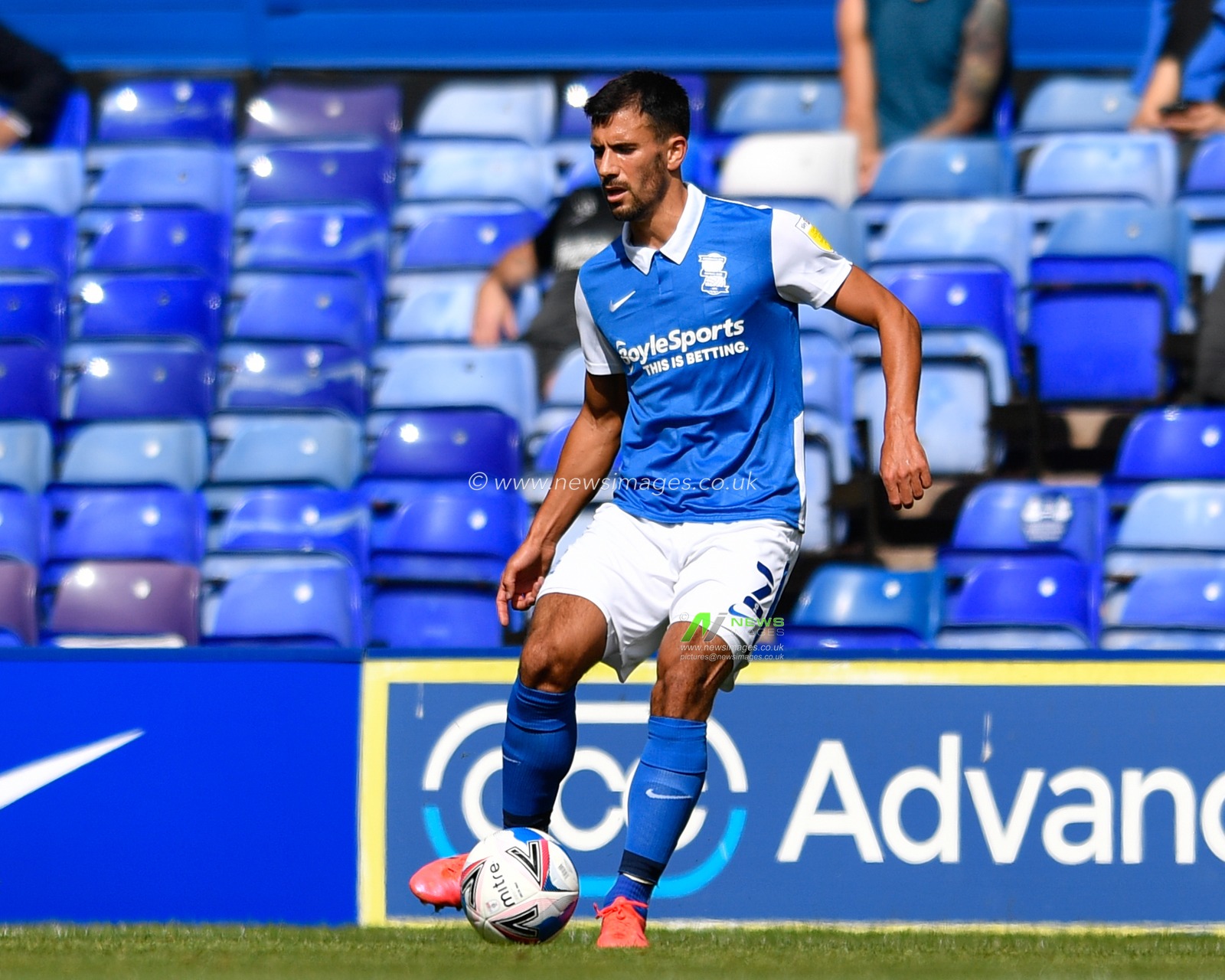 Maxime Colin (2) of Birmingham City passes the ball