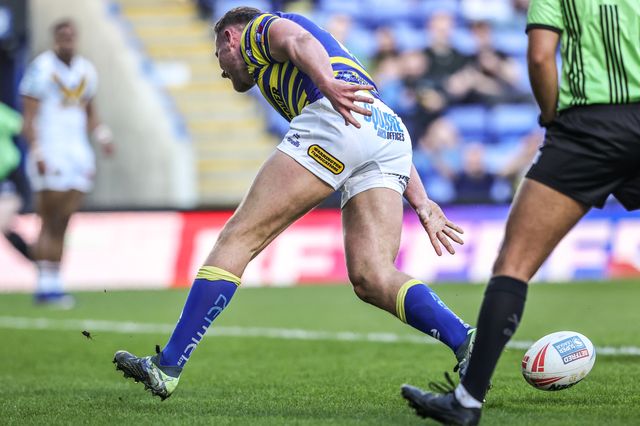 Ben Currie of Warrington Wolves goes over for a try during the Betfred Super League round 5 match Warrington Wolves vs Castleford Tigers at The Halliwell Jones Stadium, Warrington, United Kingdom on 21 March 2026

(Photo by Alfie Cosgrove/News Images)