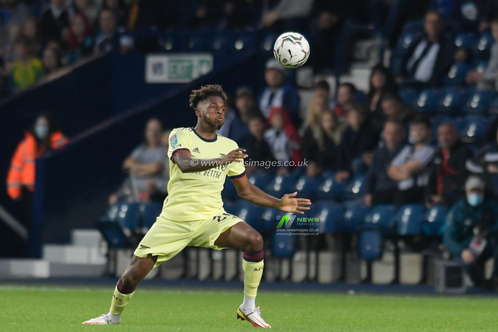 Nuno Tavares #20 of Arsenal looks to control the ball
