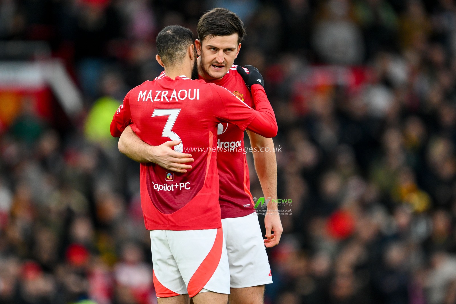 Noussair Mazraoui and Harry Maguire of Manchester United embrace prior to the Emirates FA Cup 5th Round match Manchester United vs Fulham at Old Trafford, Manchester, United Kingdom, 2nd March 2025

(Photo by Craig Thomas/News Images)