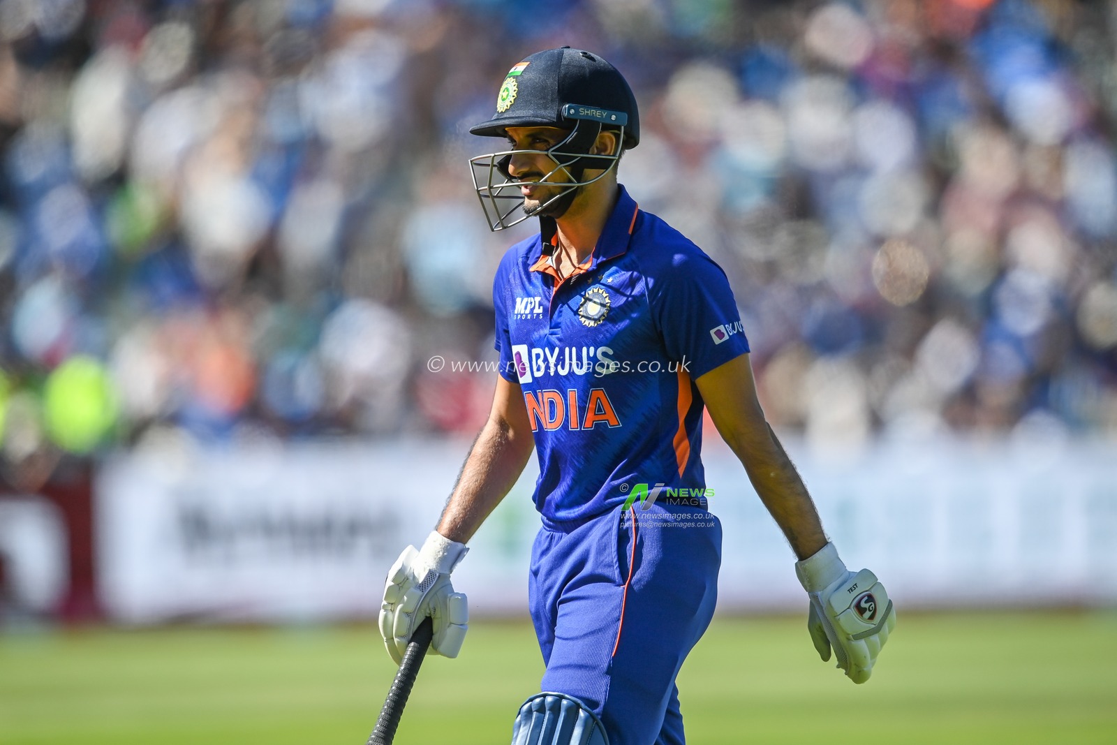 Harshal Patel of India Leaves the field after being caught out by Richard Gleeson of England