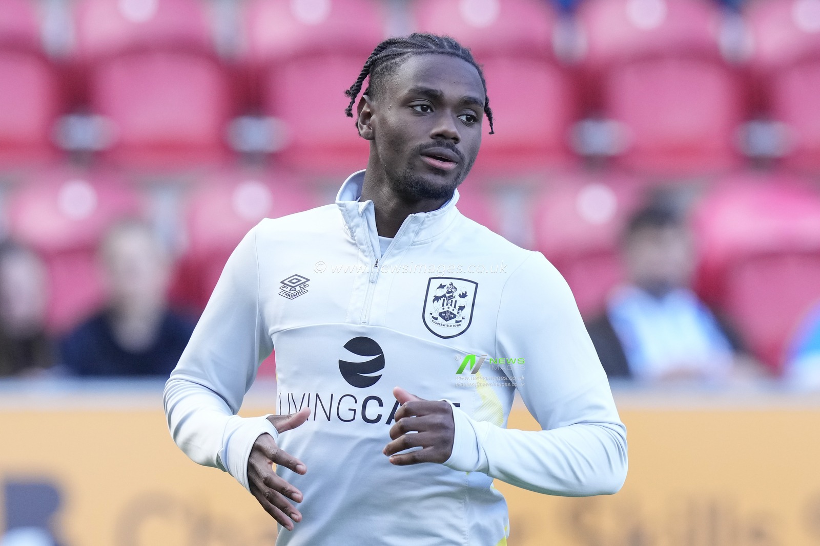 Aaron Rowe #20 of Huddersfield Town warms up before the Sky Bet Championship match Rotherham United vs Huddersfield Town at AESSEAL New York Stadium, Rotherham, United Kingdom, 15th October 2022

(Photo by Steve Flynn/News Images)