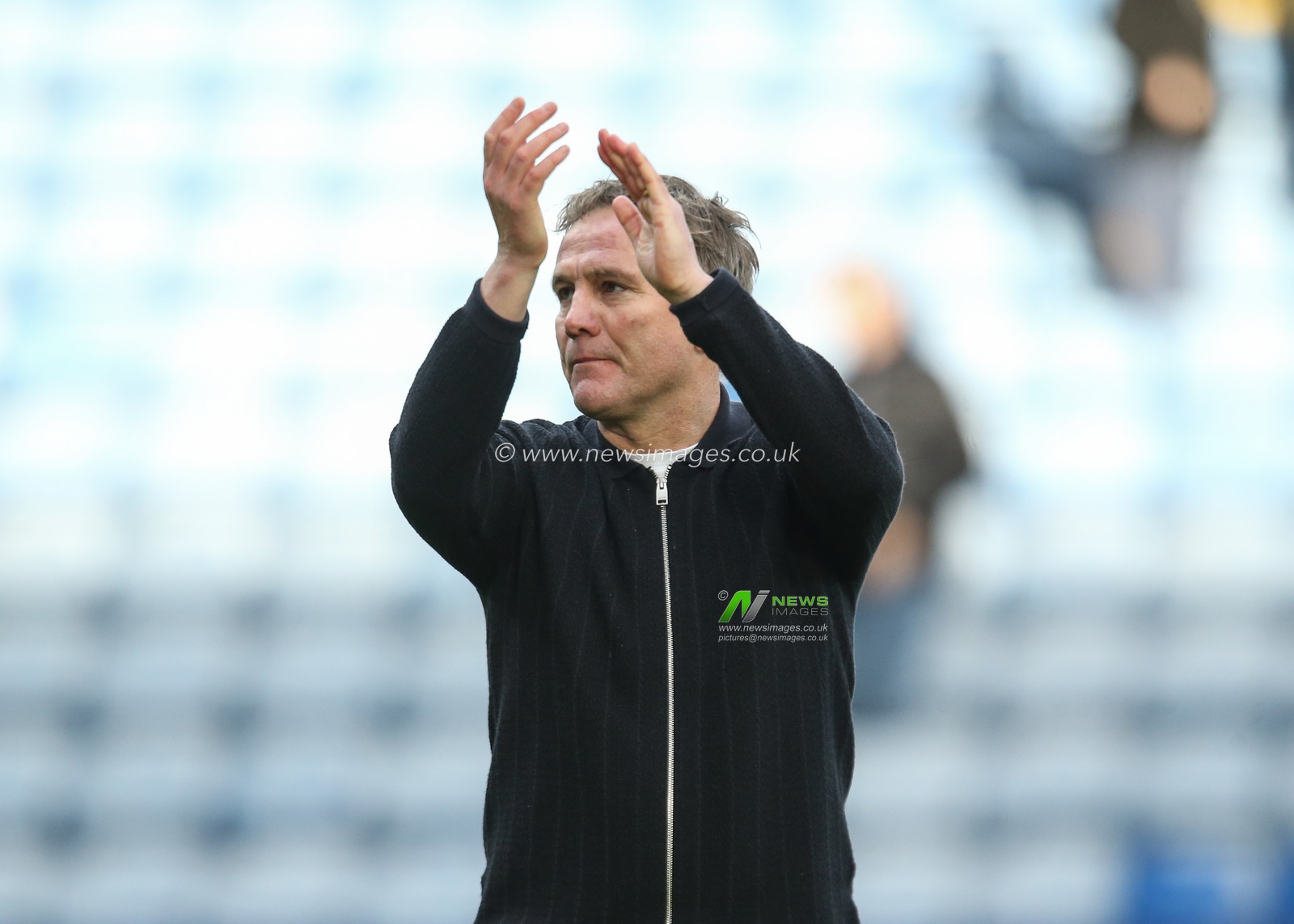 Phil Parkinson manager of Wrexham applauds the fans after the final whistle during the Sky Bet Championship match Sheffield Wednesday vs Wrexham at Hillsborough, Sheffield, United Kingdom, 31st January 2026

(Photo by Richard Bierton/News Images)
