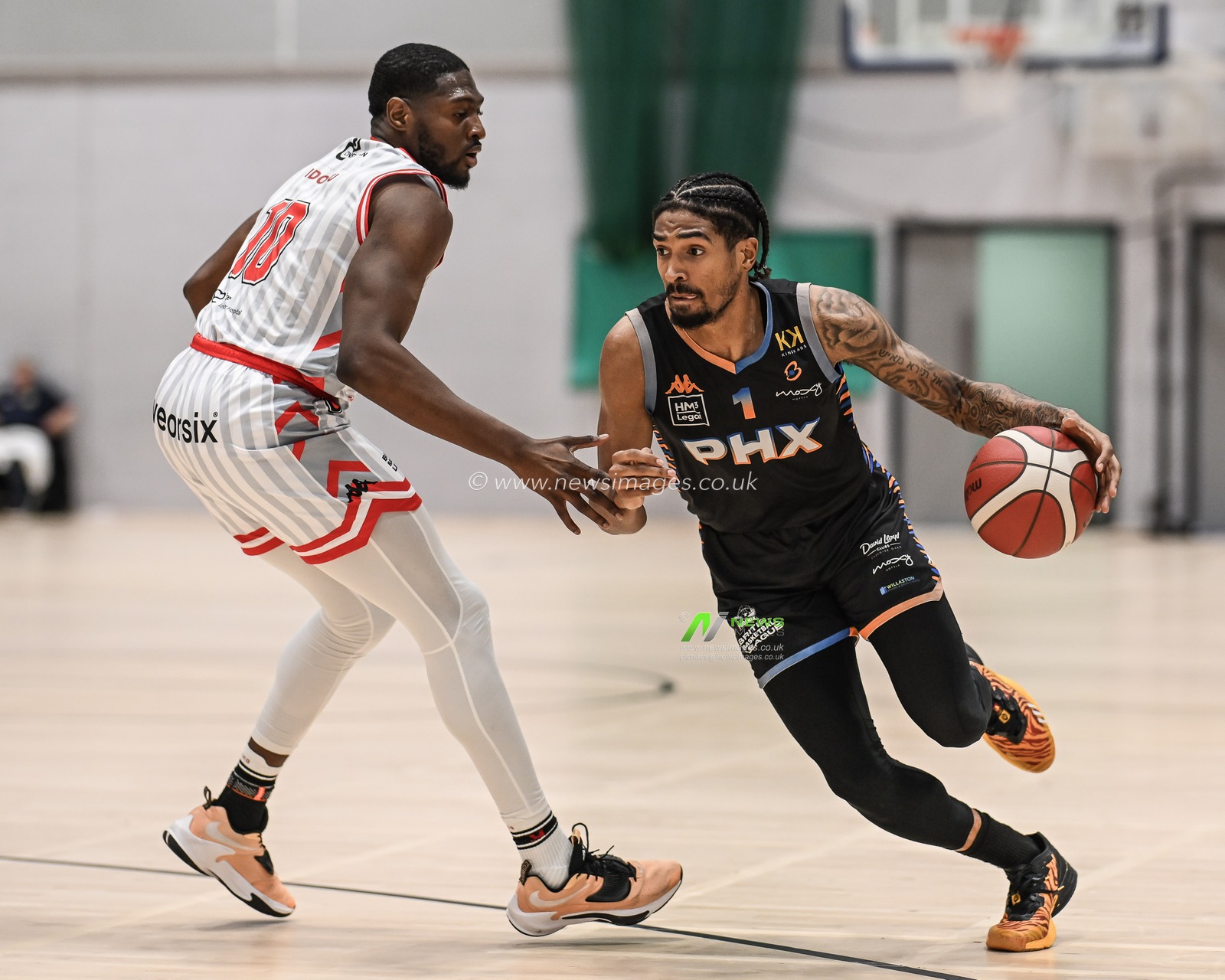 Cam Christon of Cheshire Phoenix drives to the basket during the British Basketball Championship match Cheshire Phoenix vs Leicester Riders at Ellesmere Port Sports Village, Ellesmere Port, United Kingdom, 12th November 2023

(Photo by Craig Thomas/News Images)