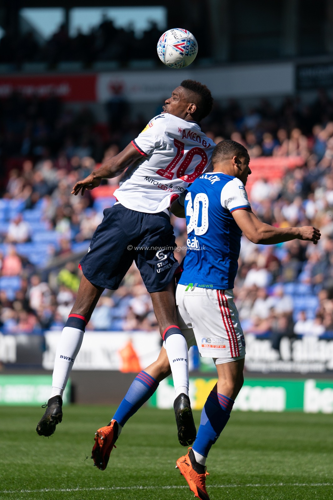 Bolton Wanderers Sammy Ameobi battles with Ipswich Town Myles Kenlock

6th April 2019 , University of Bolton Stadium, Bolton, England;  Sky bet Championship Football, Bolton Wanderers vs Ipswich Town 

Credit: Terry Donnelly/News Images