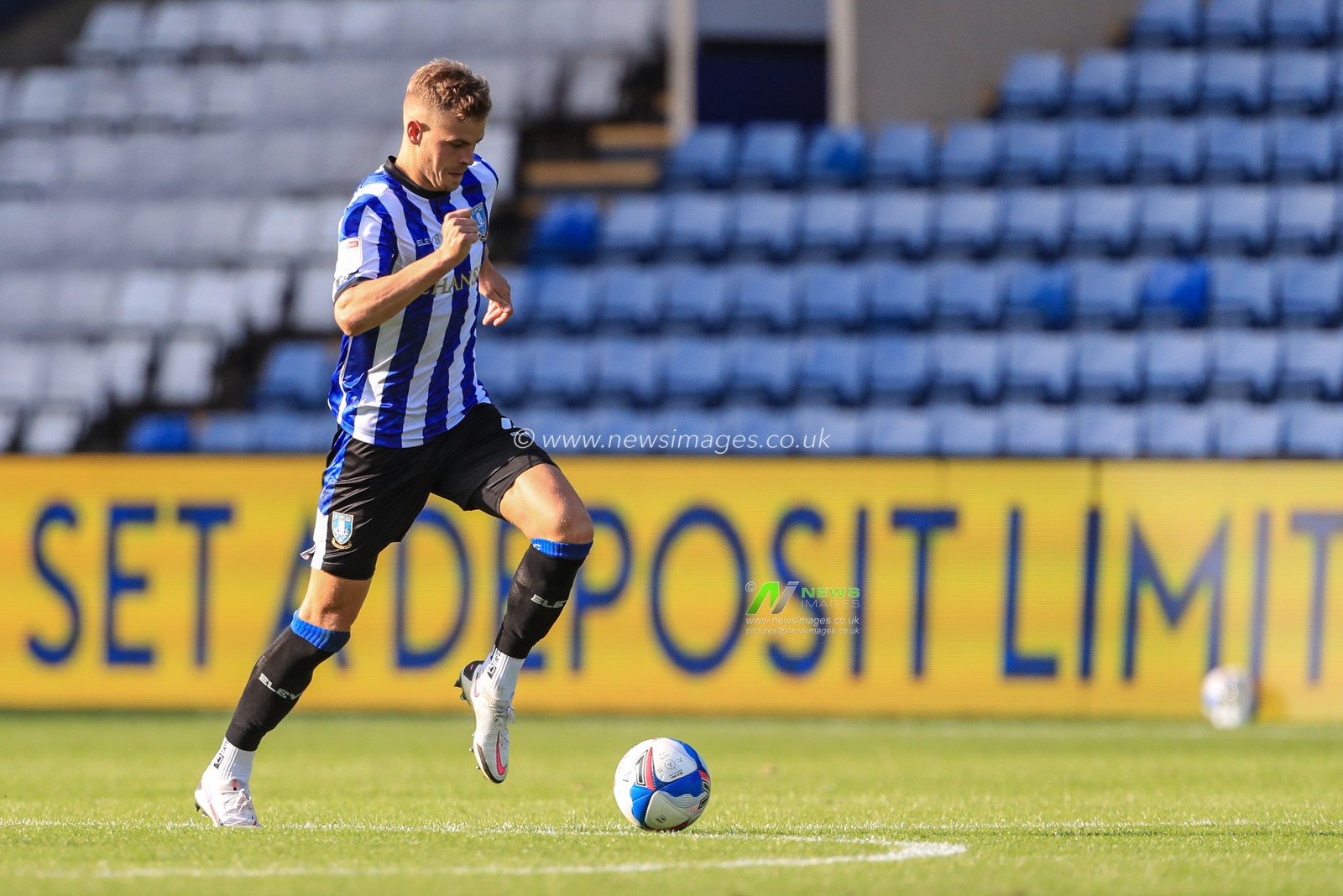 Joost van Aken (4) of Sheffield Wednesday in action during the game