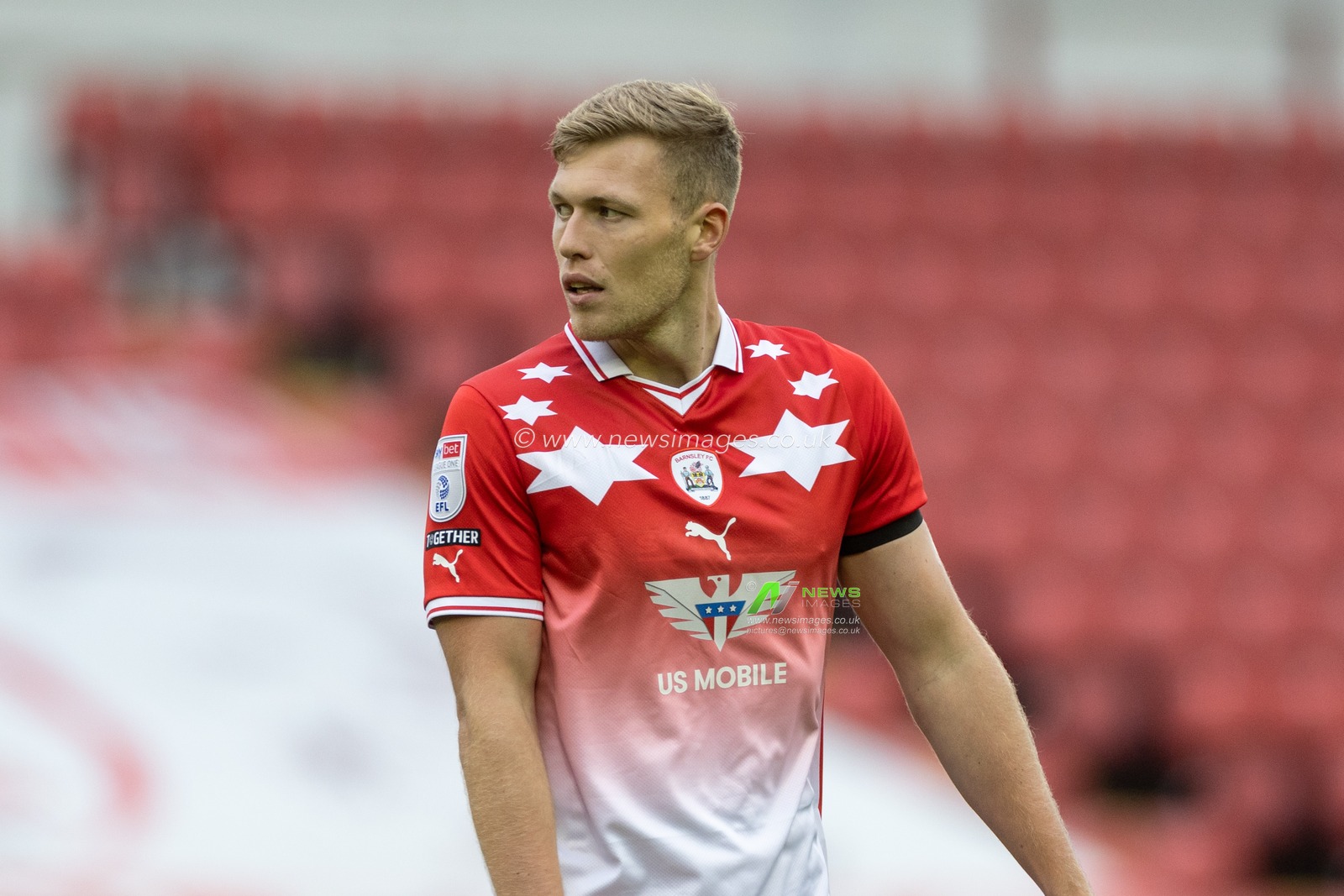 Sam Cosgrove #9 of Barnsley in action during the Sky Bet League 1 match Barnsley vs Burton Albion at Oakwell, Barnsley, United Kingdom, 16th September 2023

(Photo by Mark Cosgrove/News Images)