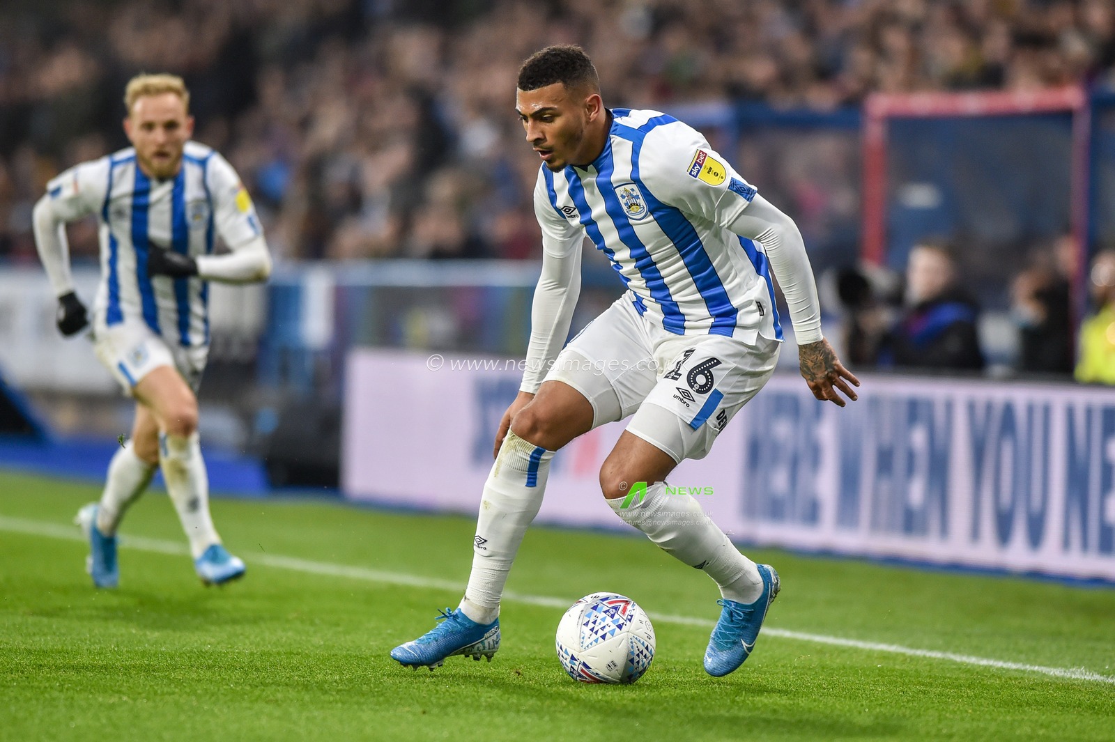23rd November 2019, John Smith's Stadium, Huddersfield, England; Sky Bet Championship, Huddersfield Town v Birmingham City :Karlan Grant (16) of Huddersfield Town step over the ball..

Credit: Dean Williams/News Images