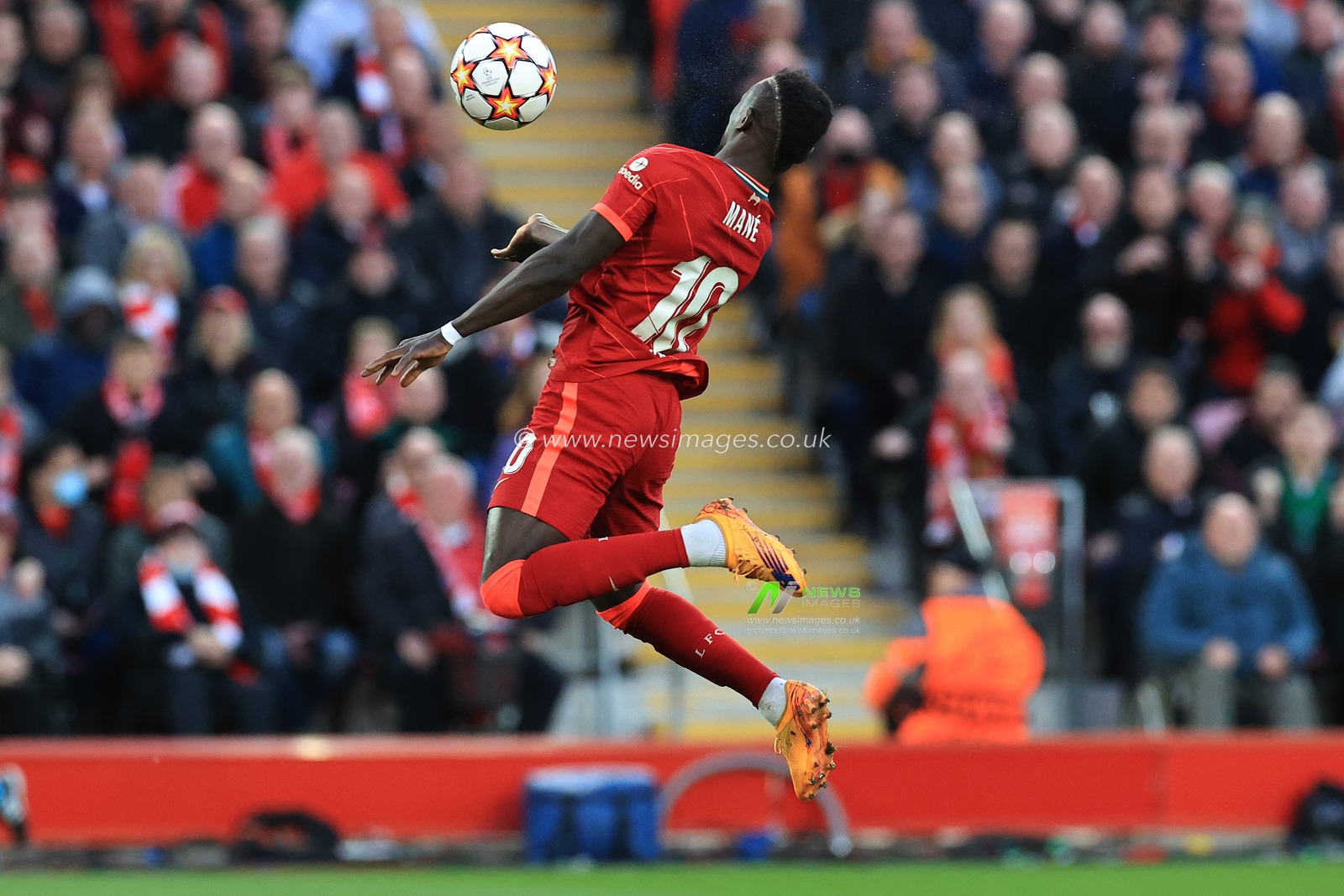 Sadio Mane #10 of Liverpool heads the ball towards goal