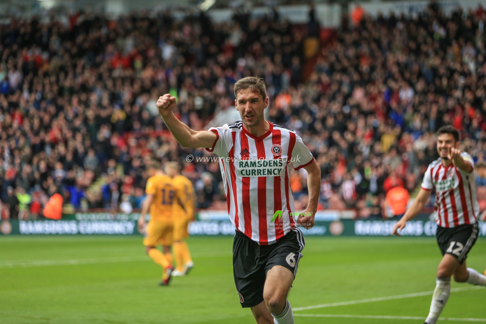 22nd September 2018, Bramall Lane, Sheffield, England; Sky Bet Championship Sheffield United v Preston North End ;  Chris Basham (06) of Sheffield United celebrates his goal to make it 2-0

Credit: Mark Cosgrove/News Images

EDITORIAL USE ONLY No use with unauthorised audio, video, data, fixture lists, club/league logos or 'live' services. Online in-match use limited to 45 images, no video emulation. No use in betting, games or single club/league/player publications and all English Football League images are subject to DataCo Licence