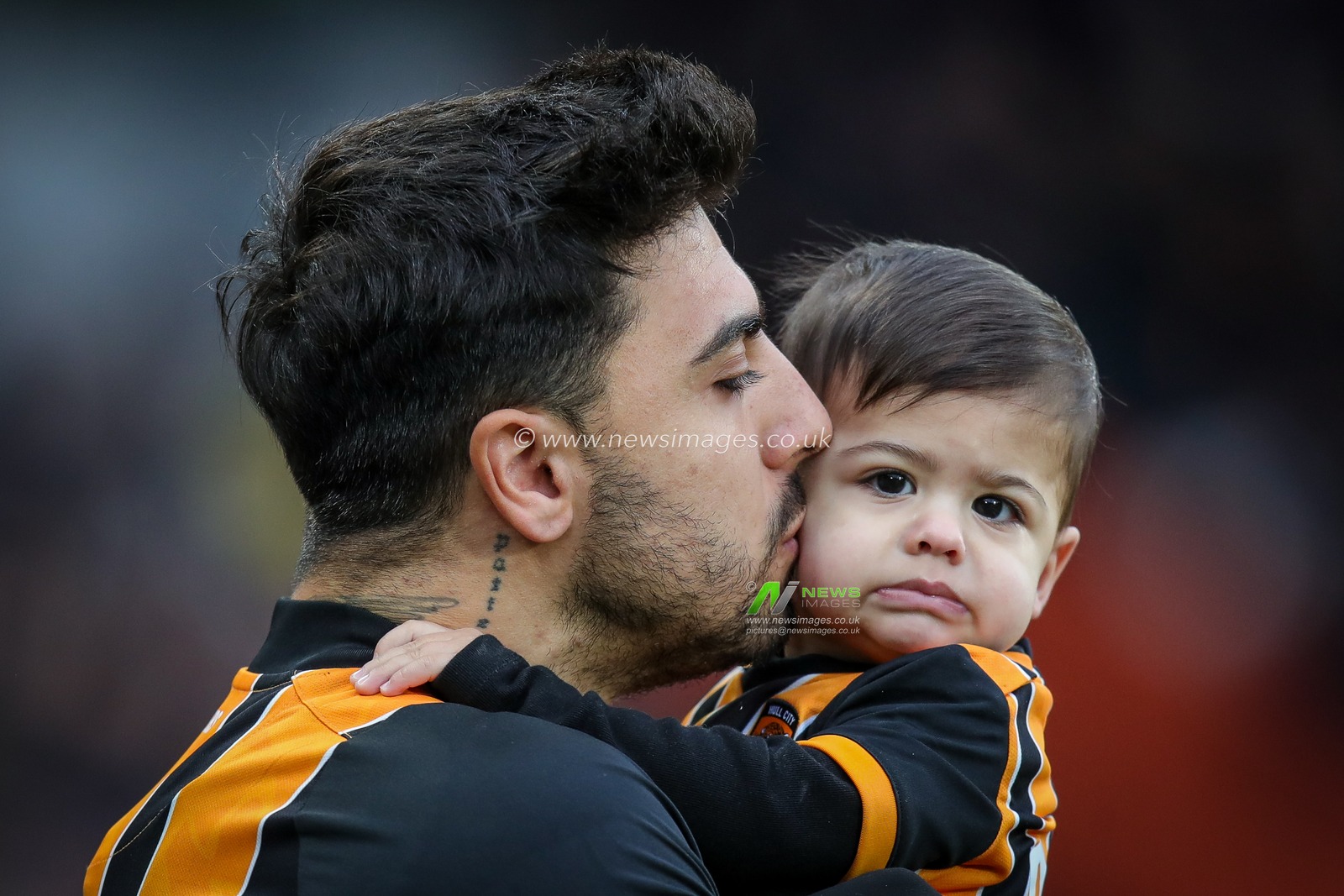 Ozan Tufan #7 of Hull City kisses his son during the Sky Bet Championship match Hull City vs Cardiff City at MKM Stadium, Hull, United Kingdom, 4th February 2023

(Photo by James Heaton/News Images)