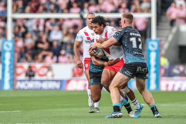 Tristan Sailor of St. Helens is tackled during the Betfred Super League round 19 match St Helens vs Leigh Leopards at Totally Wicked Stadium, St Helens, United Kingdom, 17th July 2025

(Photo by Alfie Cosgrove/News Images)
