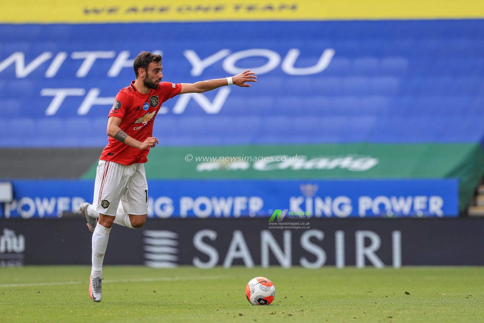 Bruno Fernandes (18) of Manchester United jumps up high in the air before scoring a penalty yo make it 0-1