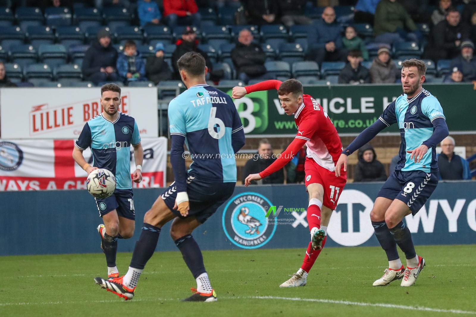 Conor Grant of Barnsley scores to make it 2-4 during the Sky Bet League 1 match Wycombe Wanderers vs Barnsley at Adams Park, High Wycombe, United Kingdom, 2nd March 2024

(Photo by Alfie Cosgrove/News Images)