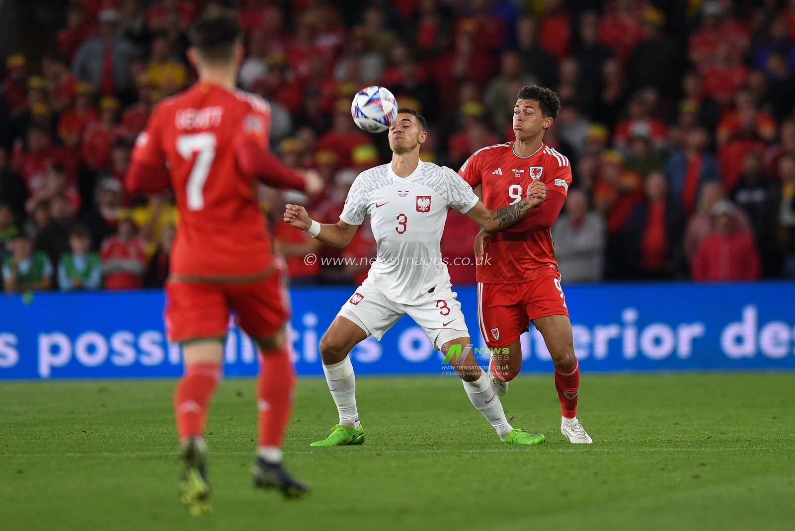 Poland's Piotr Kiwior Under pressure from Brennan Johnson of Wales during the UEFA Nations League Group A4 match between Wales vs Poland at Cardiff City Stadium, Cardiff, United Kingdom, 25th September 2022

(Photo by Mike Jones/News Images)