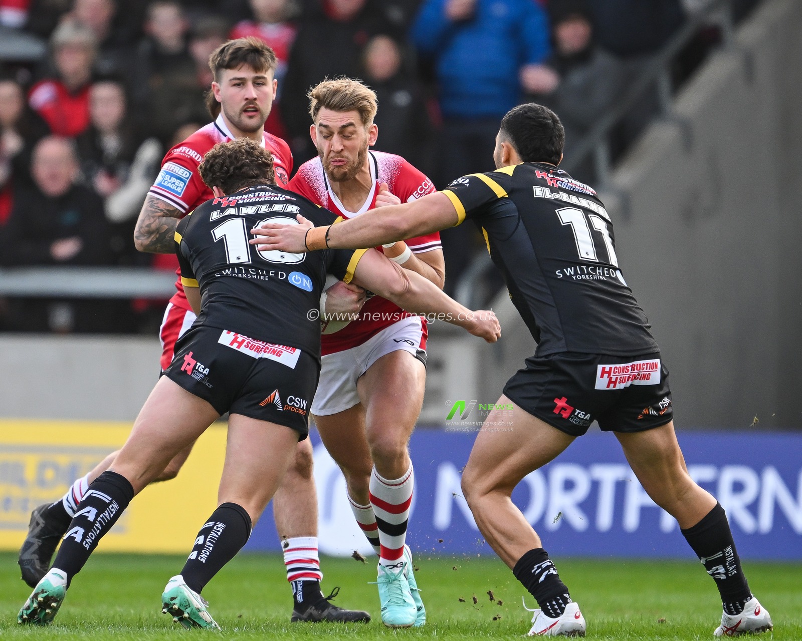 Jack Ormondroyd of Salford Red Devils is tackled by George Lawler of Castleford Tigers and Elie El-Zakhem of Castleford Tigers during the Betfred Super League match Salford Red Devils vs Castleford Tigers at Salford Community Stadium, Eccles, United Kingdom, 25th February 2024

(Photo by Craig Thomas/News Images)