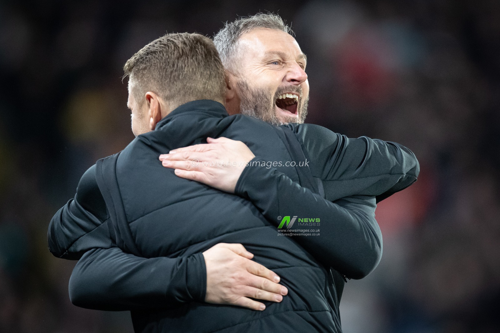 Goalkeeping coach Barry Richardson and First team coach Andy Dawson celebrate the victory after Sky Bet Championship match Hull City vs Wigan Athletic at MKM Stadium, Hull, United Kingdom, 5th October 2022

(Photo by James Heaton/News Images)