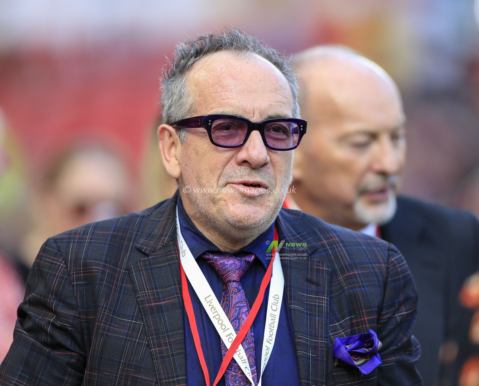 23rd August 2019 , Anfield, Liverpool, England; Premier League Football, Liverpool vs Arsenal ;  pop singer Elvis Costello attends the game

Credit: Conor Molloy/News Images 


Premier League/EFL Football images are subject to DataCo Licence