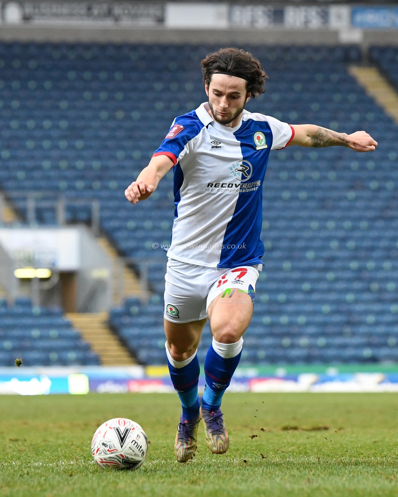 Lewis Travis #27 of Blackburn Rovers has a shot at goal