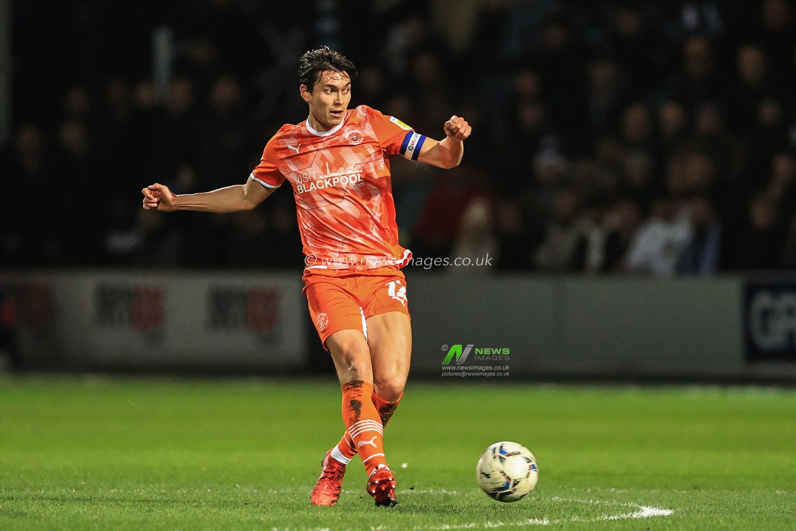 Kenny Dougall #12 of Blackpool in action during the game