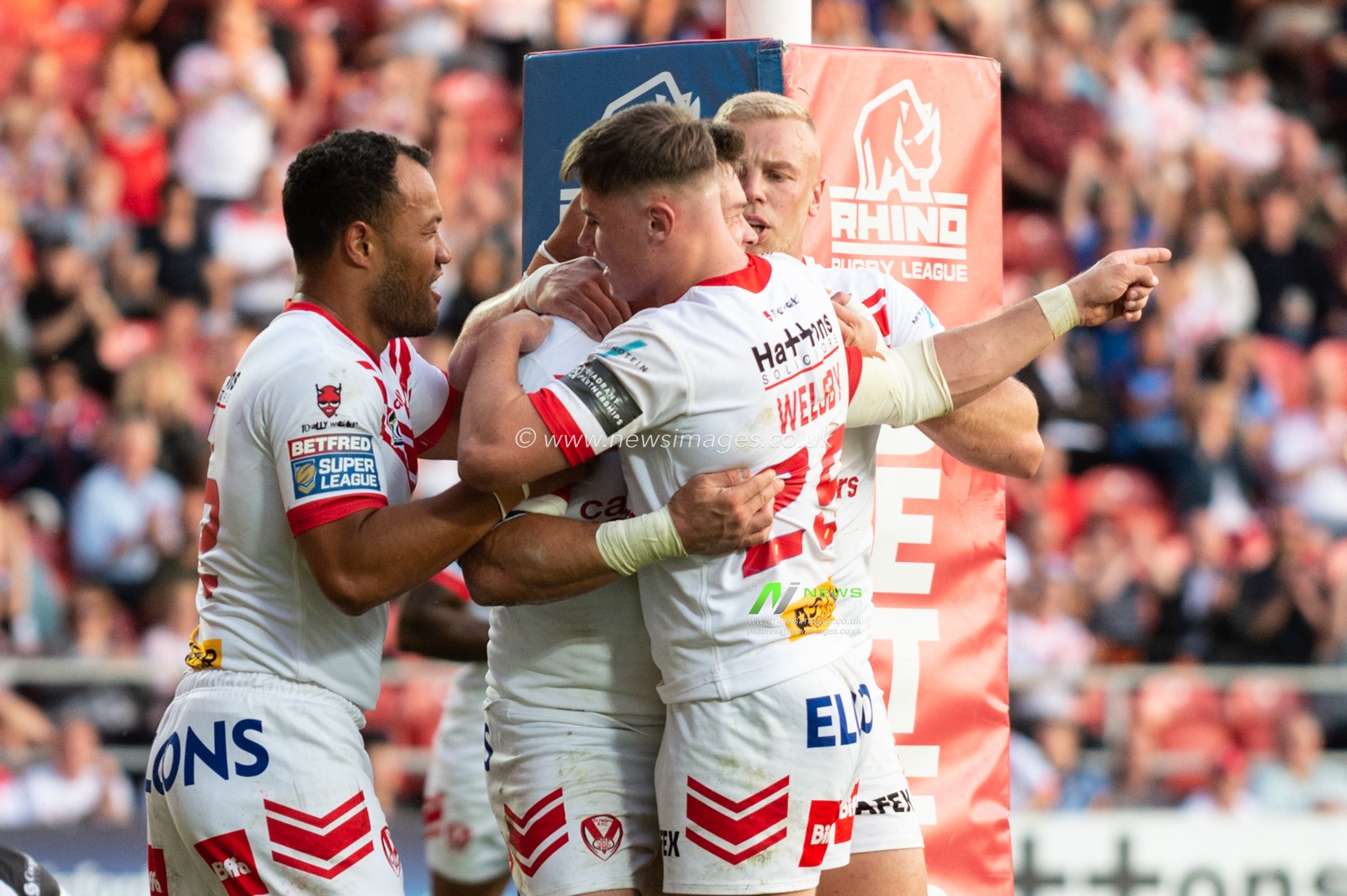 2nd August 2019 , Totally Wicked Stadium, St Helens, England;  Betfred Super League, Round 24, St Helens vs Wakefield Trinity ; Louie McCarthy-Scarsbrook of St Helens celebrates scoring his try with team mates

Credit: Richard Long/News Images