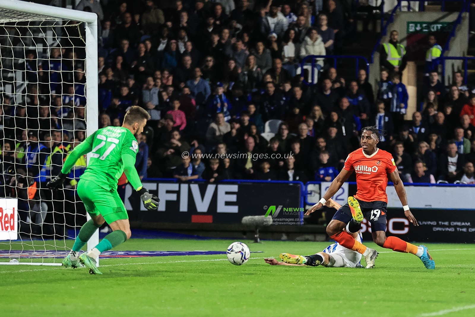 Jordan Rhodes #9 of Huddersfield Town scores to make it 1-0