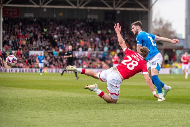 Wrexham's Sam Smith is brought down inside the box during the Sky Bet League 1 match Wrexham vs Stockport County at SToK Cae Ras, Wrexham, United Kingdom, 22nd March 2025

(Photo by Nik Mesney/News Images)
