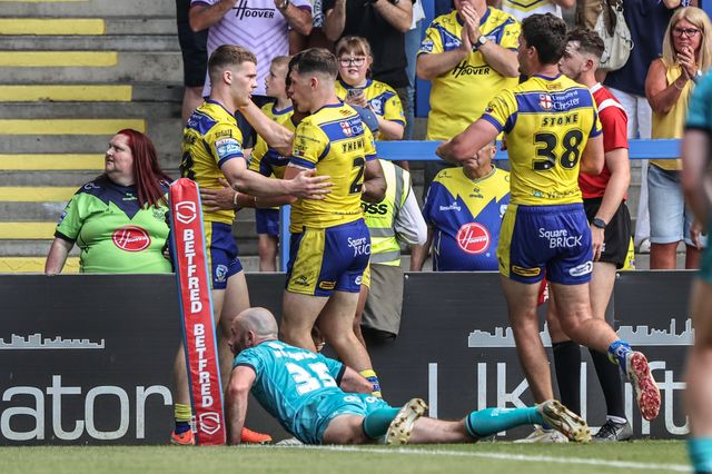 Jake Thewlis of Warrington Wolves celebrates his try during the Betfred Super League round 15 match Warrington Wolves vs Huddersfield Giants at Halliwell Jones Stadium, Warrington, United Kingdom, 21st June 2025

(Photo by Alfie Cosgrove/News Images)