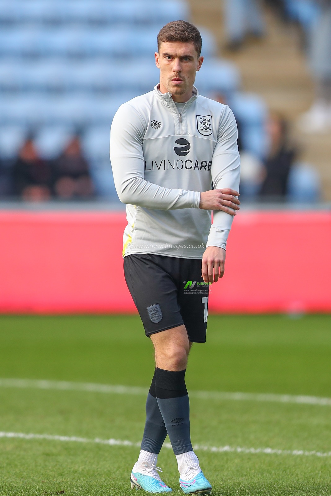 Josh Ruffels #14 of Huddersfield Town during the pre-game warm up ahead of the Sky Bet Championship match Coventry City vs Huddersfield Town at Coventry Building Society Arena, Coventry, United Kingdom, 28th January 2023

(Photo by Gareth Evans/News Images)