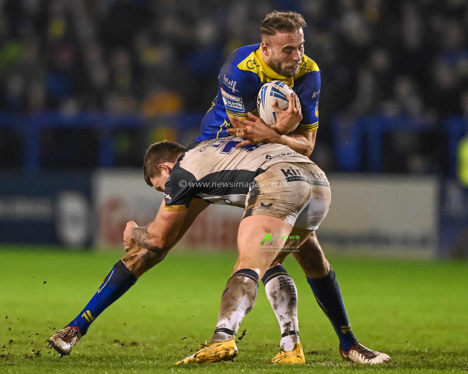 James Harrison of Warrington Wolves is tackled by Jordan Lane Hull FC during the Betfred Super League Round 2 match Warrington Wolves vs Hull FC at Halliwell Jones Stadium, Warrington, United Kingdom, 23rd February 2024

(Photo by Craig Thomas/News Images)