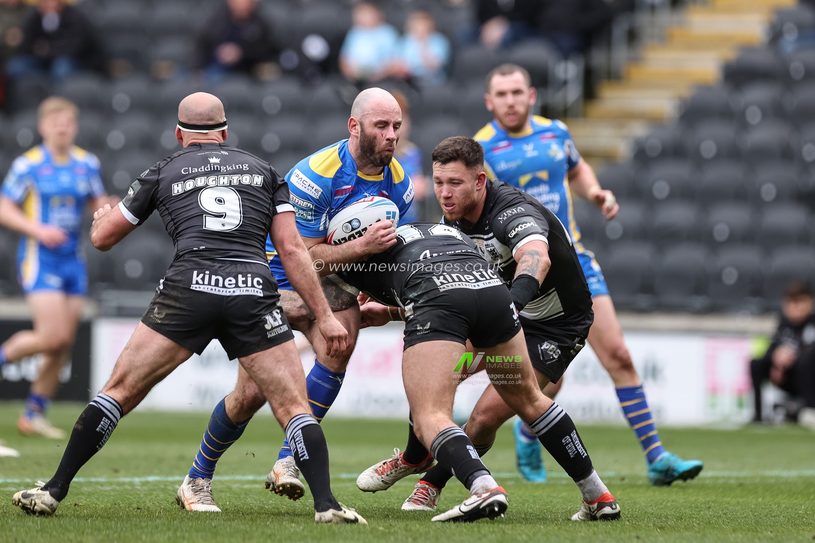 Matt Frawley of Leeds Rhinos is tackled by Joe Cator Hull FC during the Betfred Super League Round 9 match Hull FC vs Leeds Rhinos at MKM Stadium, Hull, United Kingdom, 28th April 2024

(Photo by Mark Cosgrove/News Images)