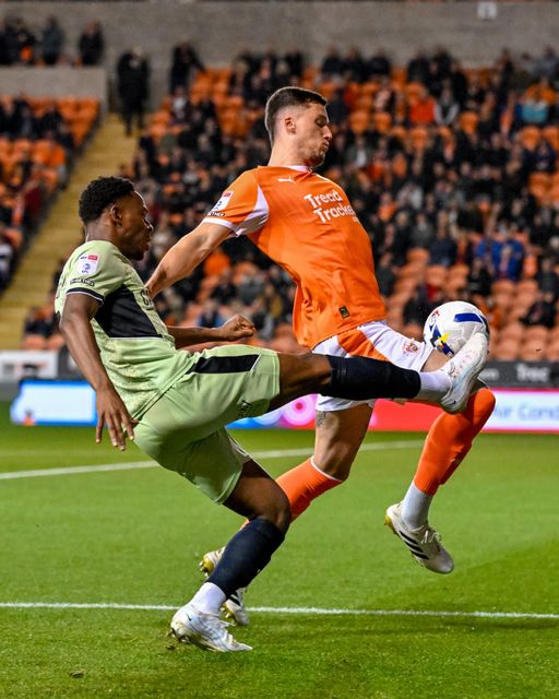 Lamine Fanne of Luton Town  puts over a cross under pressure from Oliver Casey of Blackpool during the Sky Bet League 1 match Blackpool vs Luton Town at Bloomfield Road, Blackpool, United Kingdom, 30th September 2025

(Photo by Adam Gee/News Images)