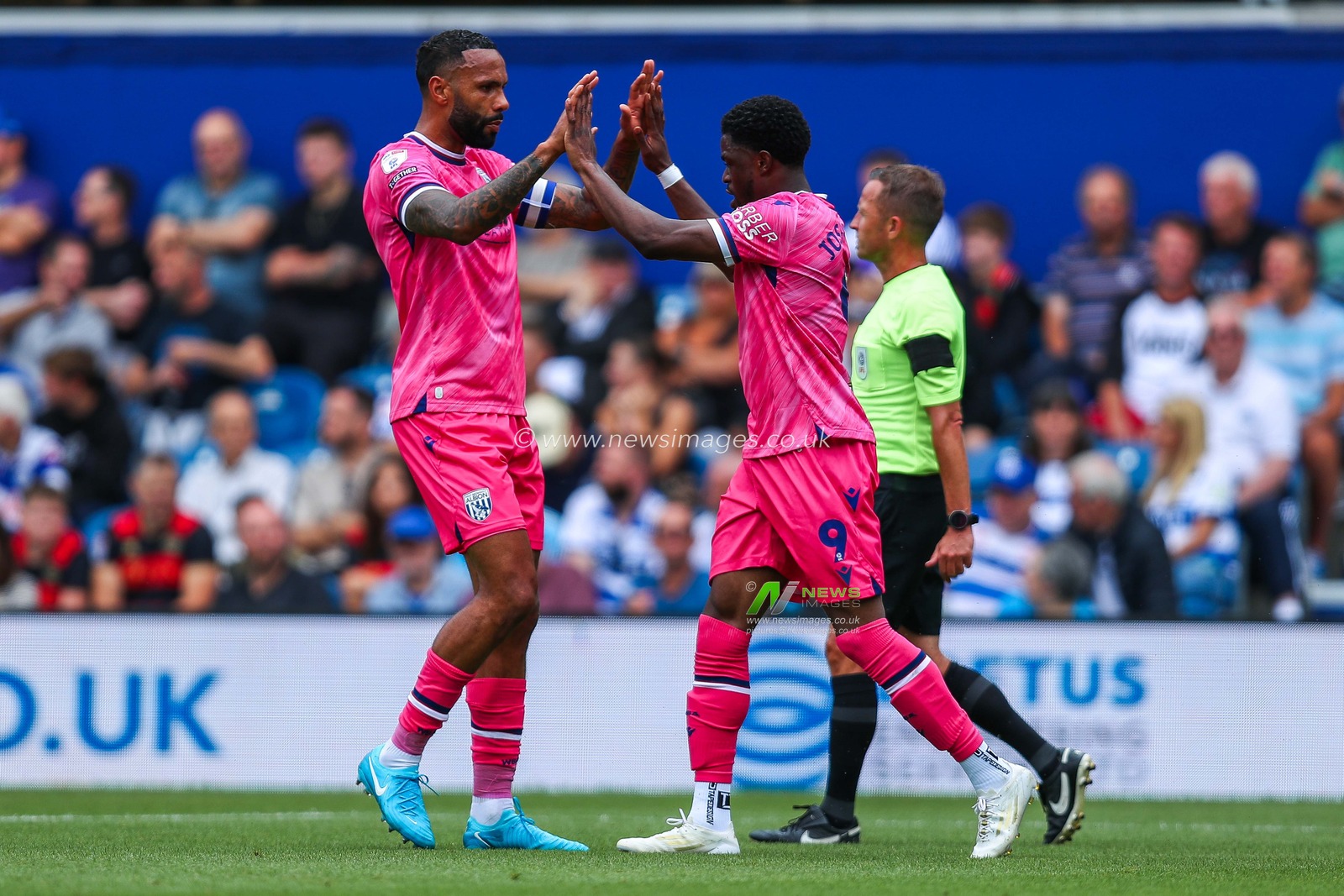 Josh Maja of West Bromwich Albion celebrates with teammates after scoring the team's first goal during the Sky Bet Championship match Queens Park Rangers vs West Bromwich Albion at Kiyan Prince Foundation Stadium, London, United Kingdom, 10th August 2024

(Photo by Izzy Poles/News Images)