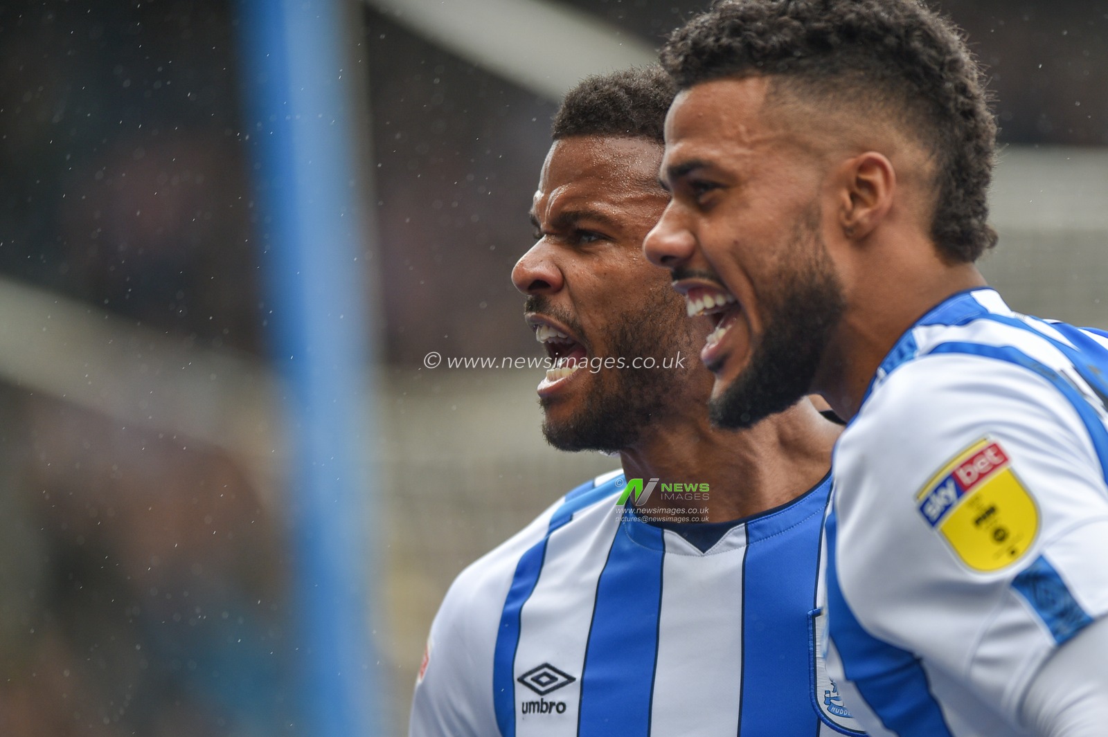 28th September 2019, John Smith's Stadium, Huddersfield, England; Sky Bet Championship, Huddersfield Town v Millwall :Fraizer Cambell (22) of Huddersfield Town celebrates goal with teammate Jaden Brown.

Credit: Dean Williams/News Images