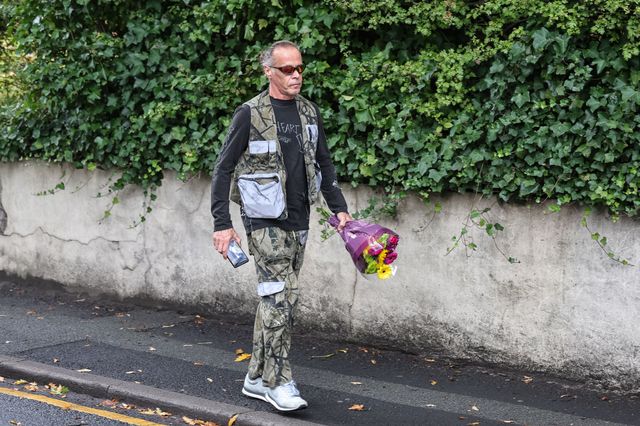 Flowers are brought to the scene as people pay their respects during the Manchester synagogue terror attack day 2 at Heaton Park Shul, Manchester, United Kingdom, 3rd October 2025

(Photo by Mark Cosgrove/News Images)