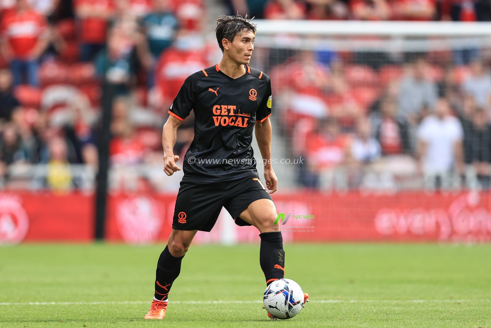 Kenny Dougall #12 of Blackpool during the game