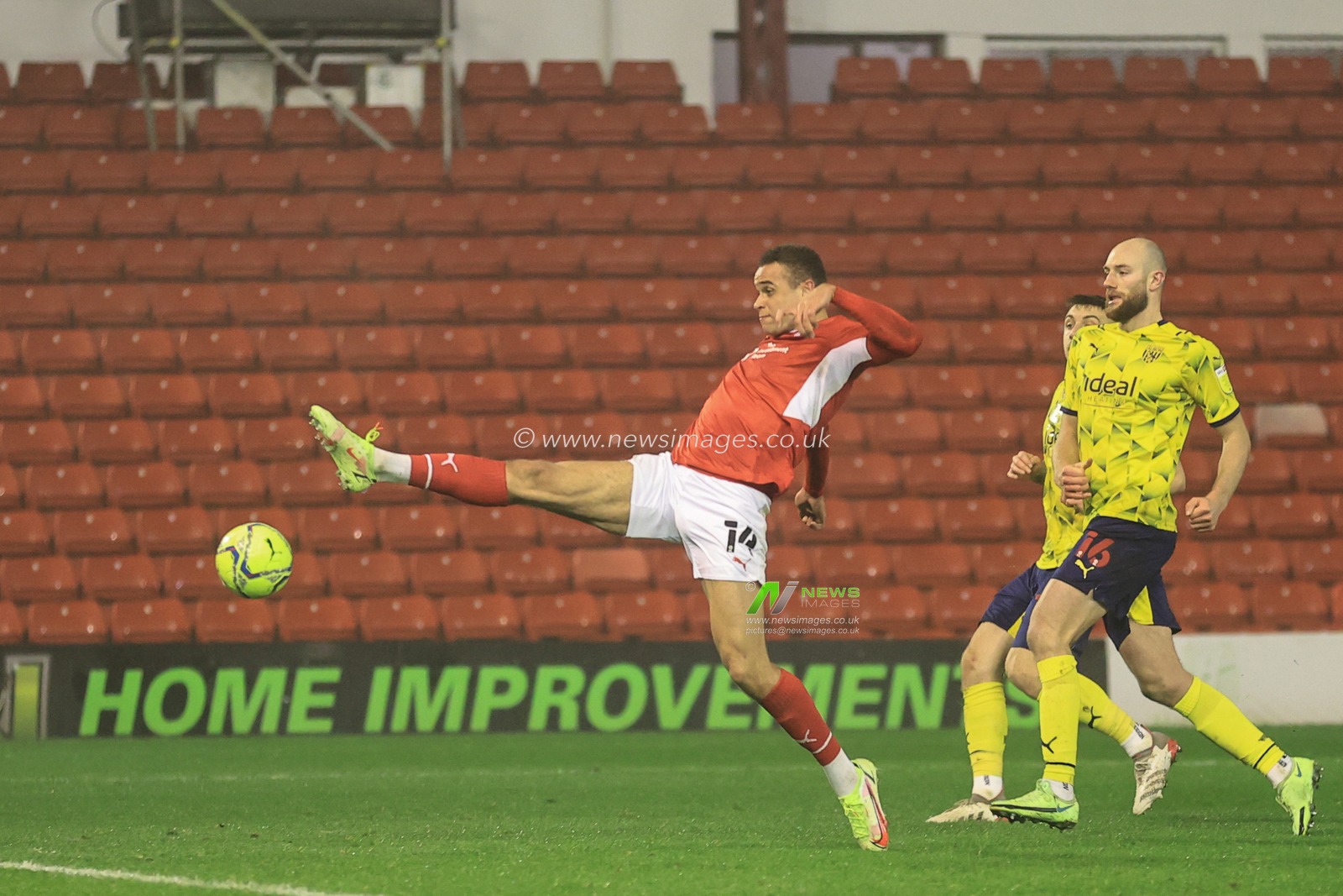 Carlton Morris #14 of Barnsley just misses the ball in front of goal