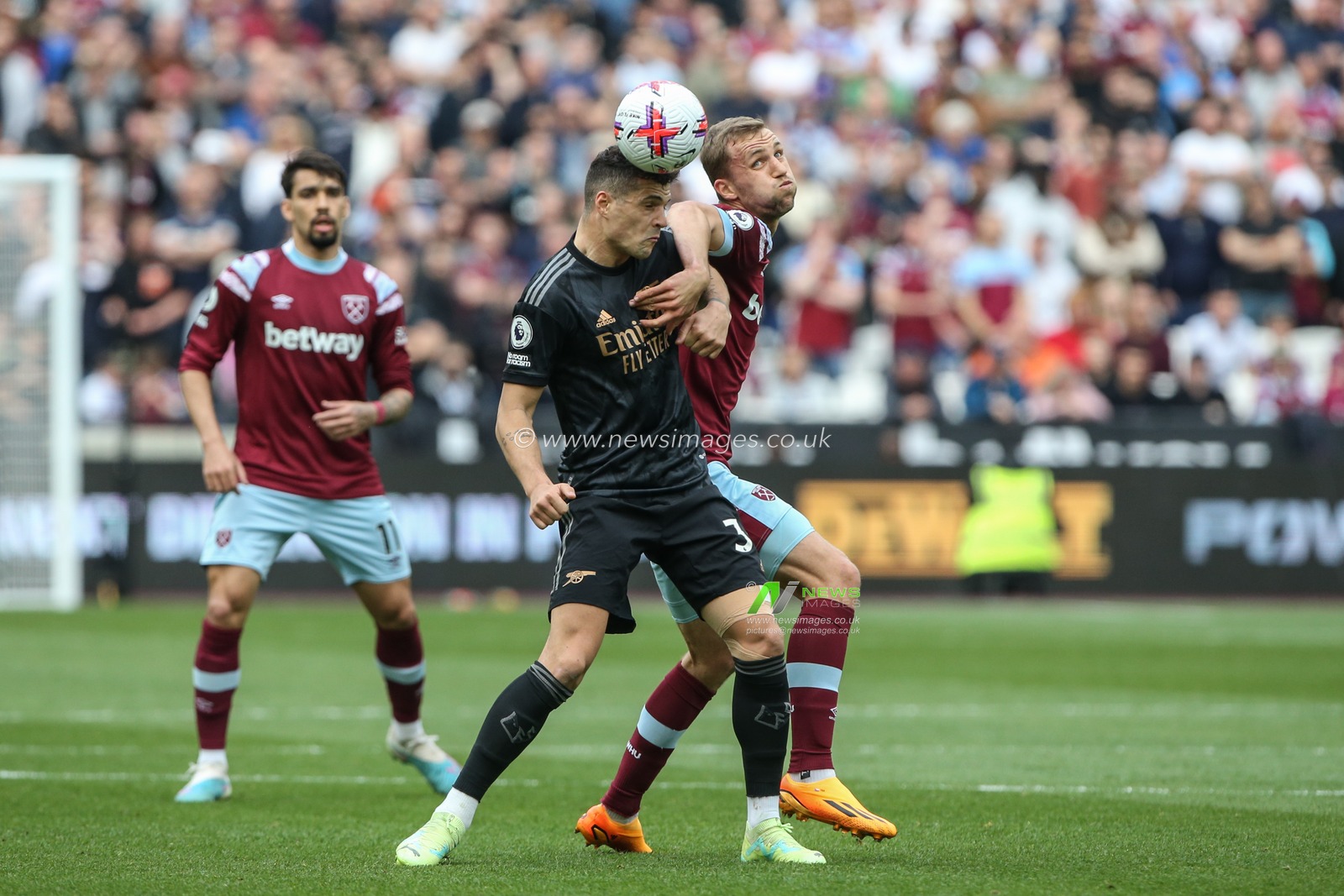 Granit Xhaka #34 of Arsenal TomÃ¡Å¡ SouÄek #28 of West Ham United battle for the ball during the Premier League match West Ham United vs Arsenal at London Stadium, London, United Kingdom, 16th April 2023

(Photo by Arron Gent/News Images)