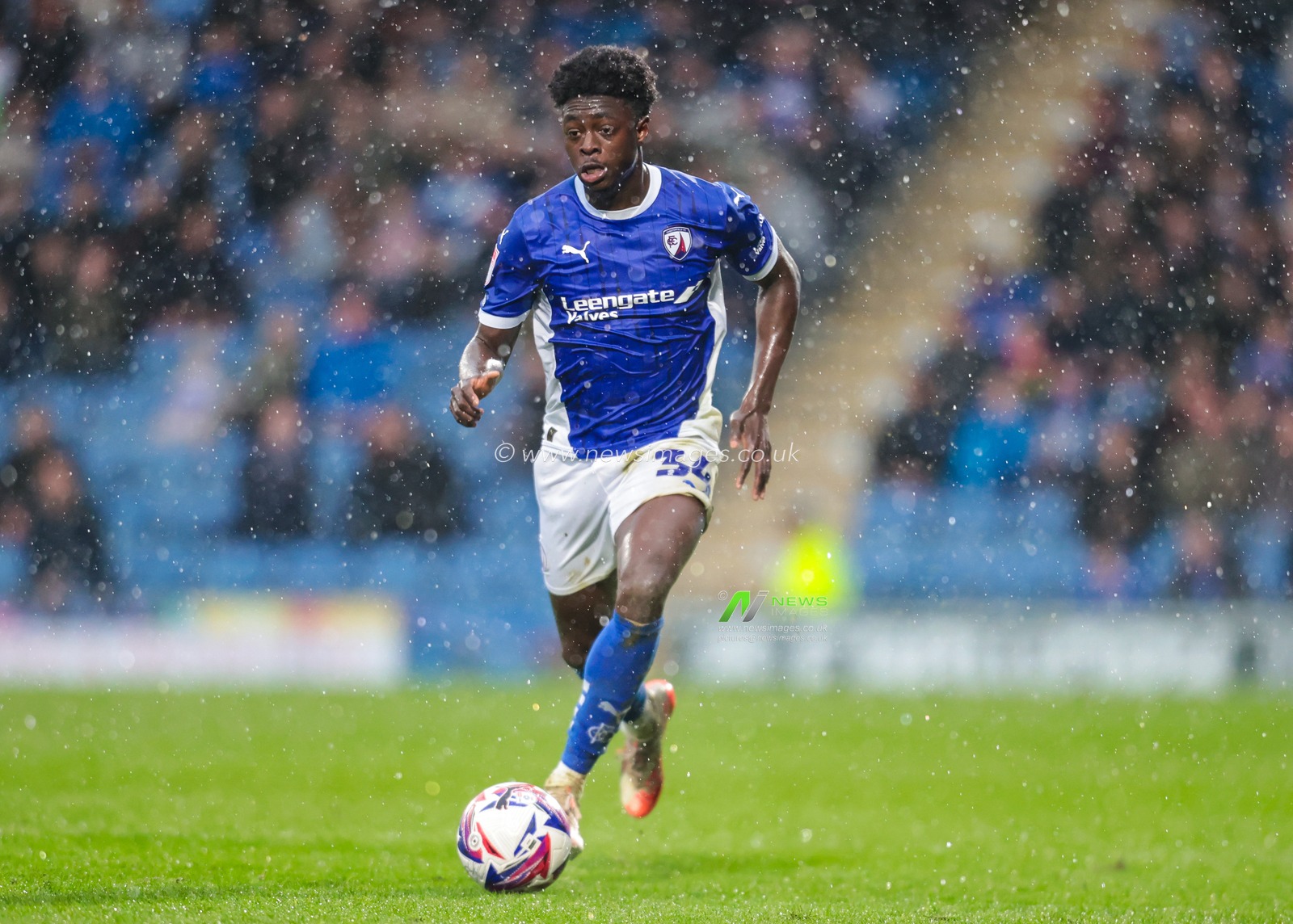 Michael Olakigbe of Chesterfield  in action during the Sky Bet League 2 match Chesterfield vs Harrogate Town at SMH Group Stadiumact Stadium, Chesterfield, United Kingdom, 22nd March 2025

(Photo by Richard Bierton/News Images)
