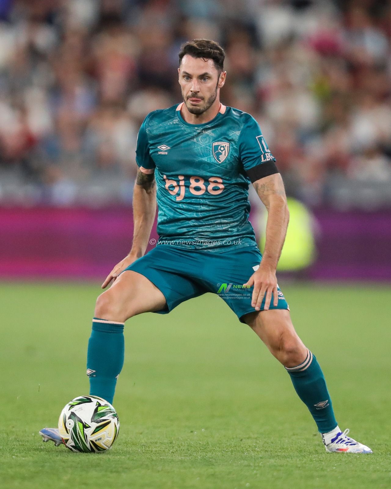 Adam Smith of Bournemouth in action during the Carabao Cup match West Ham United vs Bournemouth at London Stadium, London, United Kingdom, 28th August 2024

(Photo by Izzy Poles/News Images)