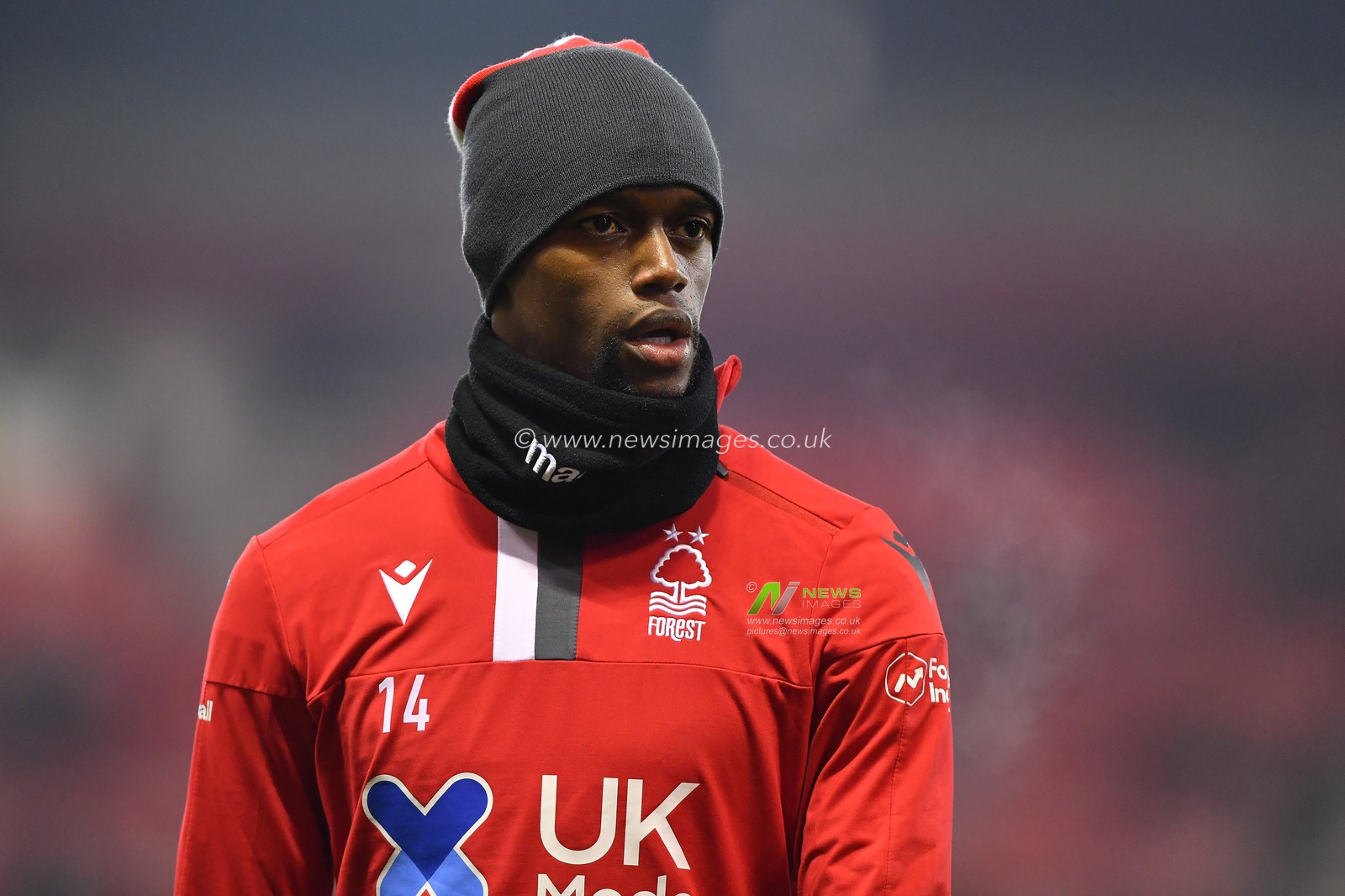22nd January 2020, City Ground, Nottingham, England; Sky Bet Championship, Nottingham Forest v Reading : New signing Adama Diakhaby (14) of Nottingham Forest warms up with his new team-mates