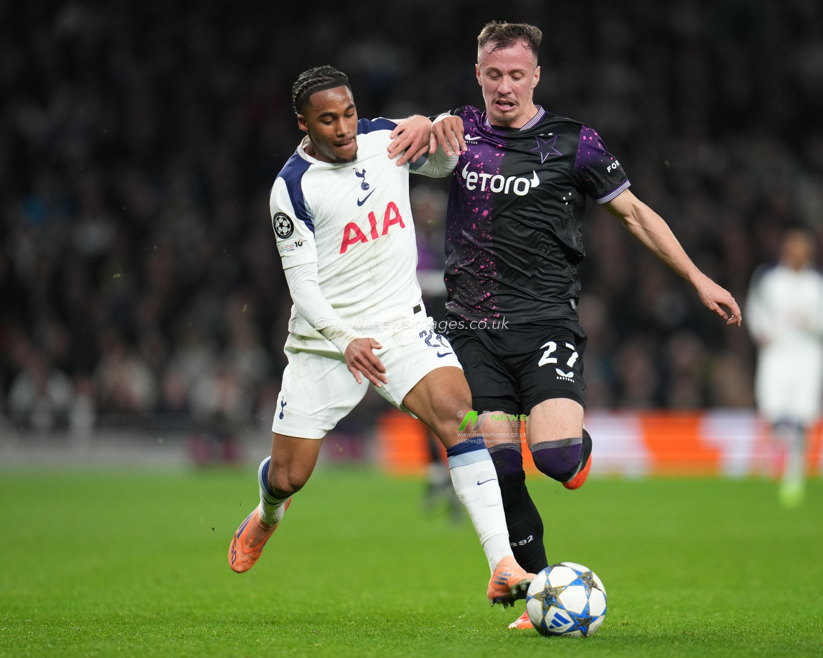 Wilson Odobert of Tottenham Hotspur and Tomas Vlcek of Slavia Prague battle for ball during the UEFA Champions League Matchday 6 of 8 Tottenham Hotspur vs Slavia Prague at Tottenham Hotspur Stadium, London, United Kingdom, 9th December 2025

(Photo by Harvey Murphy/News Images)

*** GER AUT SUI OUT ***